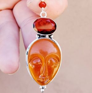 New Carved Goddess Face Garnet Silver Pendant.